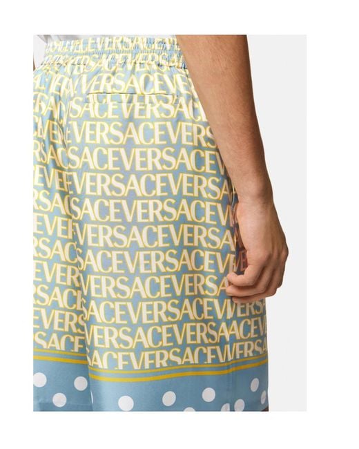 Versace Multicolor All-Over Logo Printed Knee-Length Shorts for men