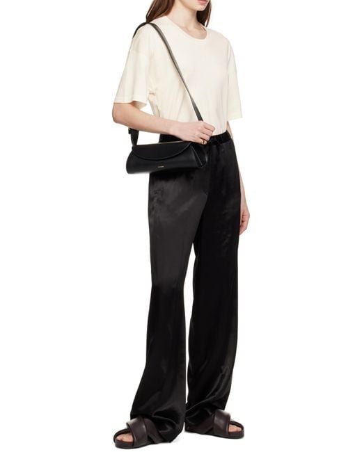 Jil Sander Black Cannolo Logo Embossed Small Shoulder Bag