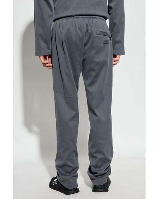 Dolce & Gabbana Blue Logo Plaque Drawstring Track Pants for men