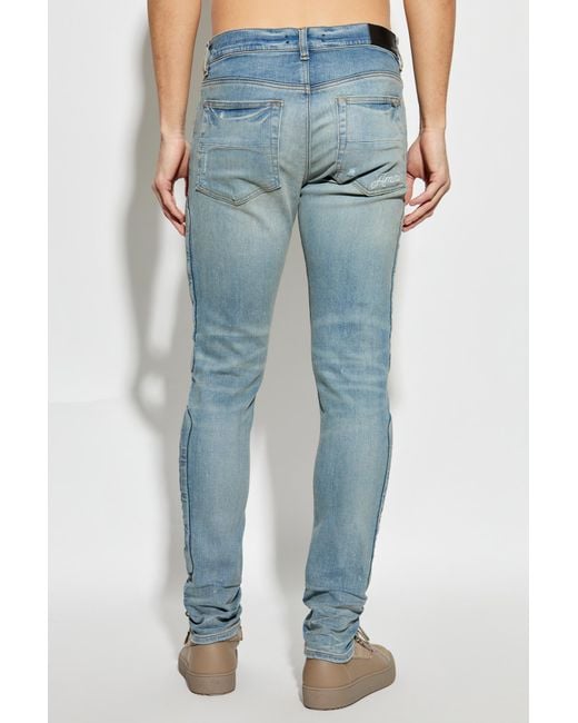 Amiri Blue Bone Detailed Skinny Jeans for men