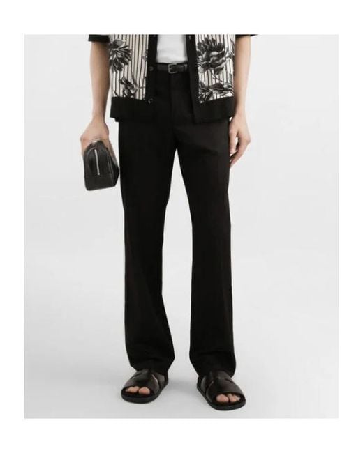 Dolce & Gabbana Black Logo Patch Trousers for men
