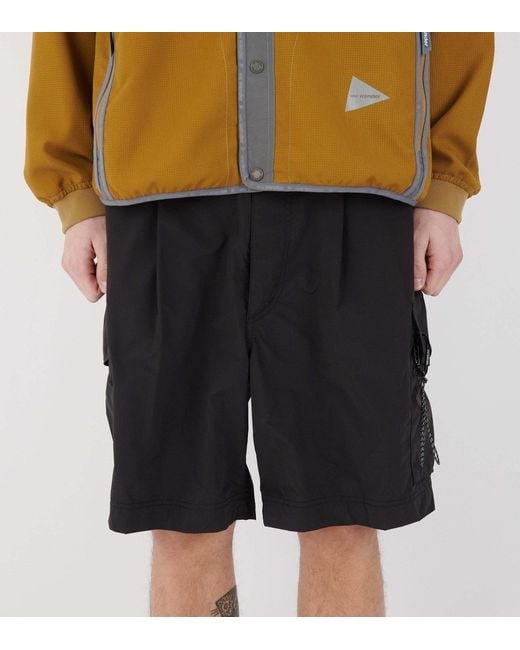 And Wander Black Oversized Cargo Shorts for men