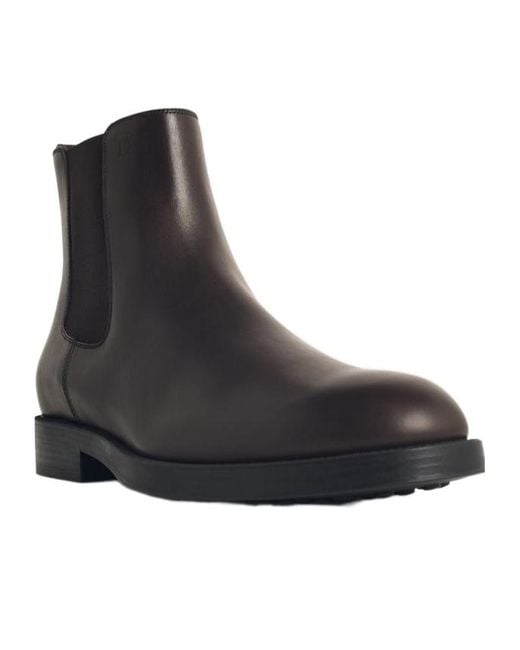 Tod's Black Round Toe Chelsea Boots for men