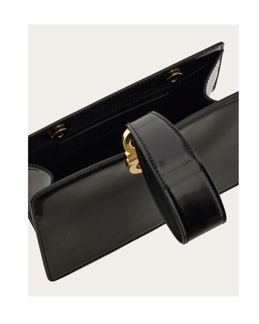 Ferragamo Ferragamo Logo Printed Wristband Clutch Bag in