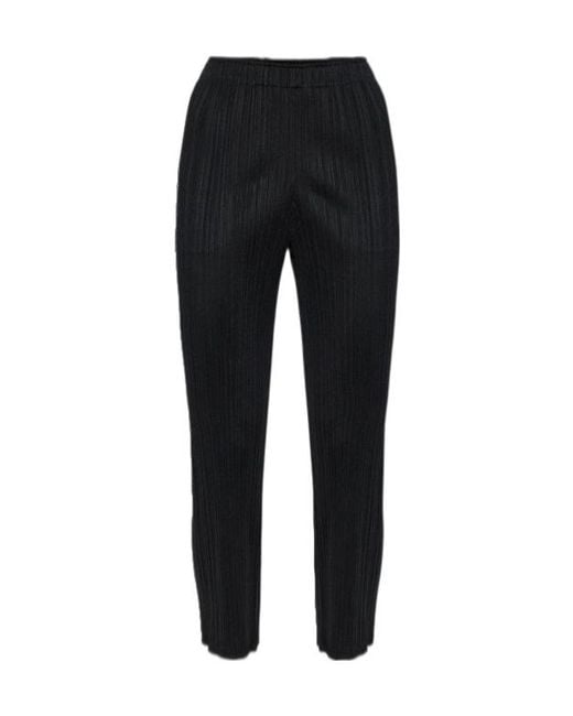 Pleats Please Issey Miyake Black Plissé-Effect Trousers