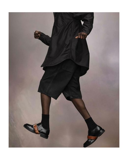 Maison Margiela Black Long-Sleeved Curved Hem Shirt for men