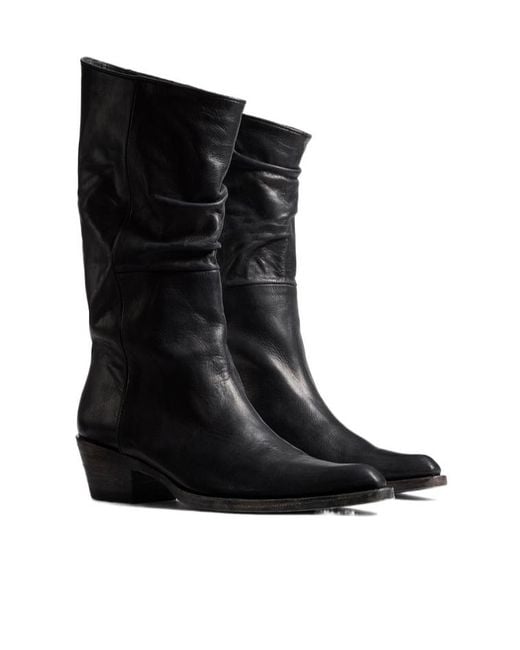 Khaite Black Pointed Toe Slip-On Boots