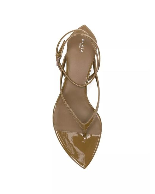 Alaïa White V-Strap Flat Sandals