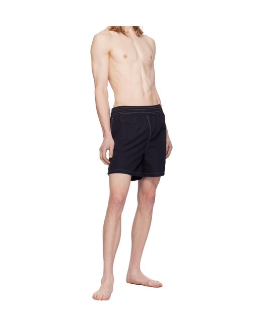 AMI Black Logo Embroidered Swim Shorts for men