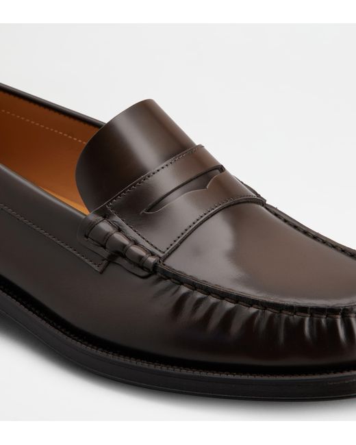 Tod's Black Round Head Loafer Shoes for men