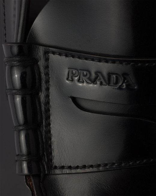 Prada Black Logo-Embossed Loafers for men