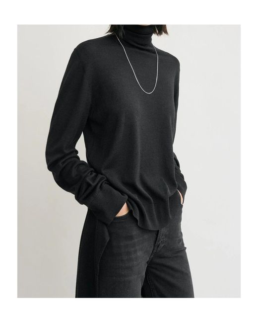 Totême  Black Totême Double-Sleeve Turtleneck Top
