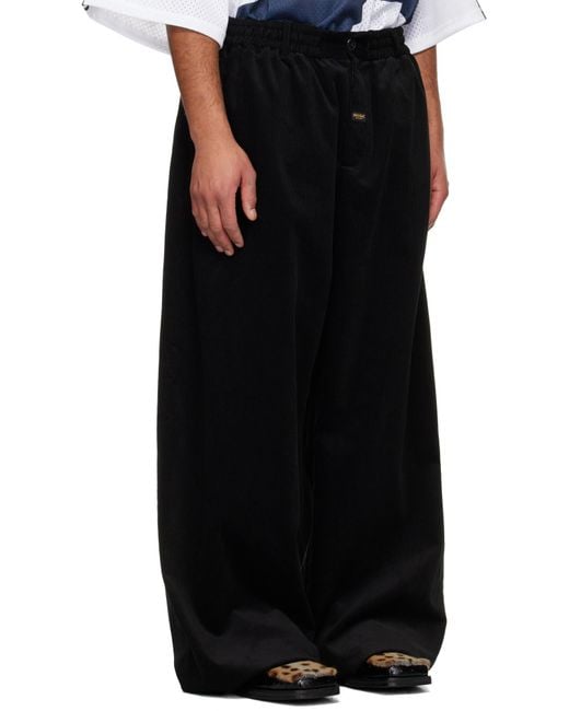 Martine Rose Black Wide-Leg Corduroy Elasticated Waistband Trousers for men