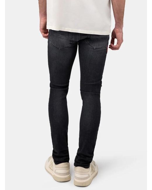 Amiri Blue South Cali Skinny Jeans for men