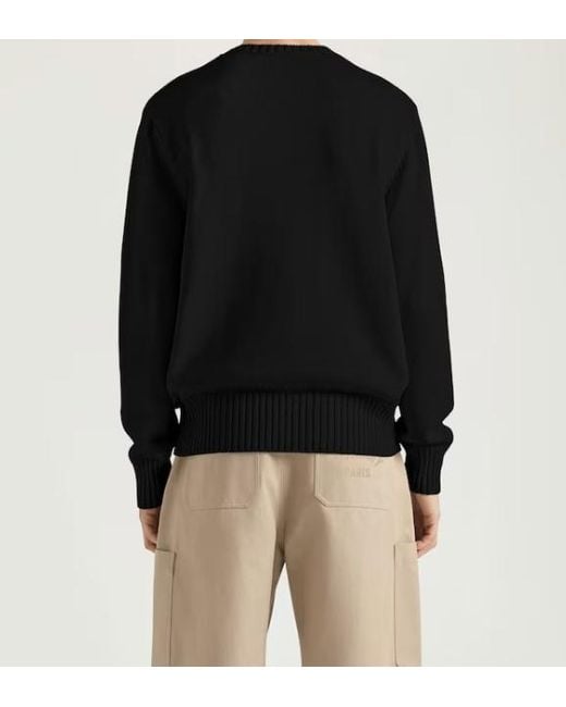 Givenchy Black Logo Embossed Ribbed Hem Sweater for men