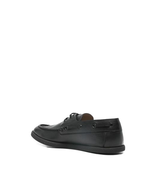 The Row Black Lace-Up Boat Shoes