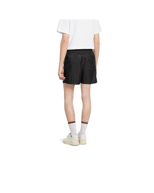 Gucci Black Monogrammed Drawstring Swim Shorts for men