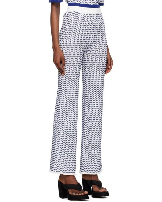 REMAIN Birger Black Striped Flared Casual Pants
