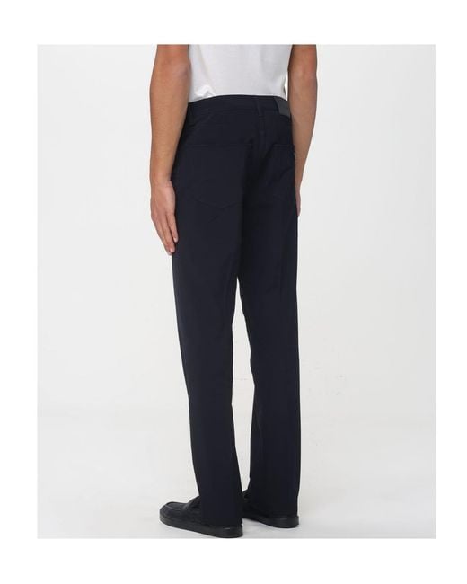 Emporio Armani Blue Logo-Patch Trousers for men