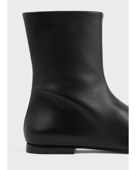 Totême  Black Zipped Leather Boots