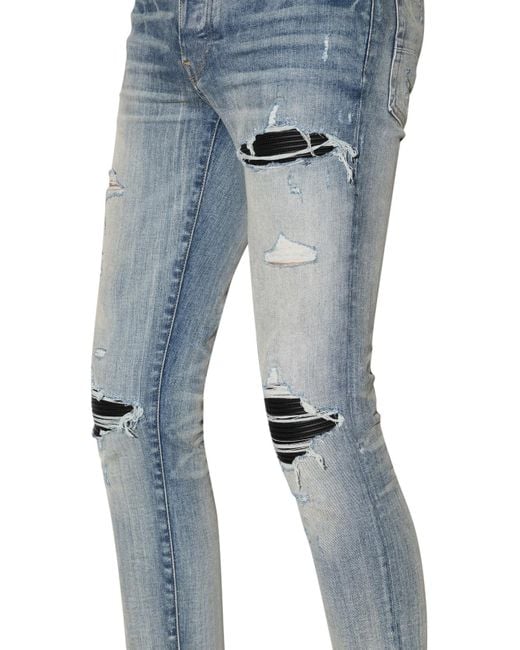 Amiri Blue Distressed-Finish Ripped Skinny Jeans for men