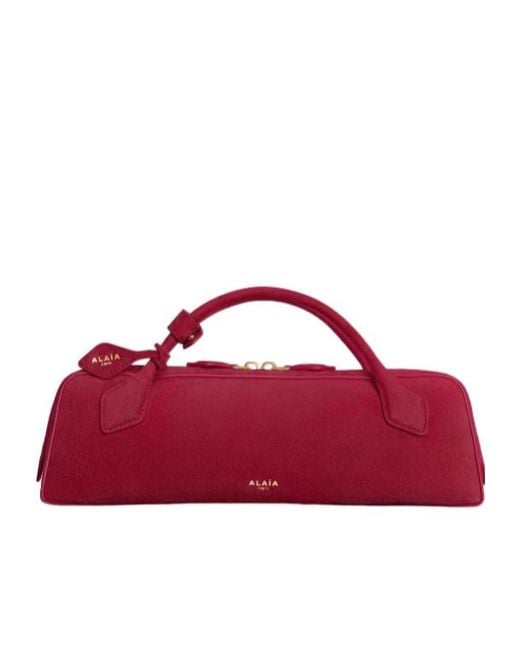 Alaïa Red Alaïa Teckel Zipped Clutch Bag