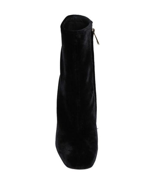 Dolce & Gabbana Black Solid Color Ankle Boots