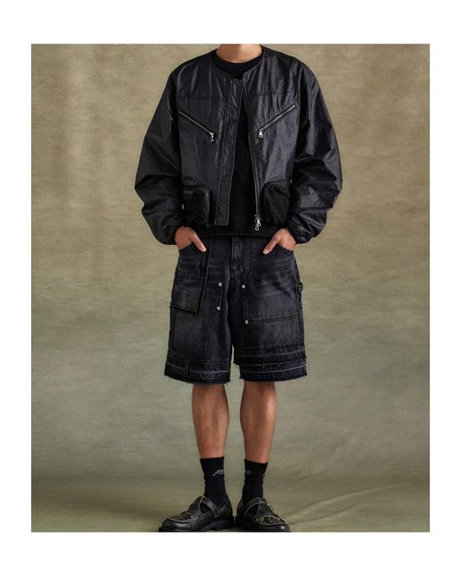 ANDERSSON BELL Blue Raw-Hem Denim Shorts for men