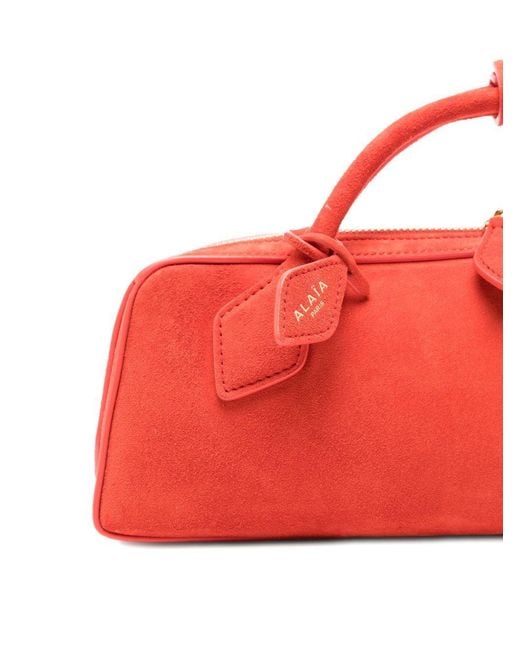 Alaïa Red Logo Handbag