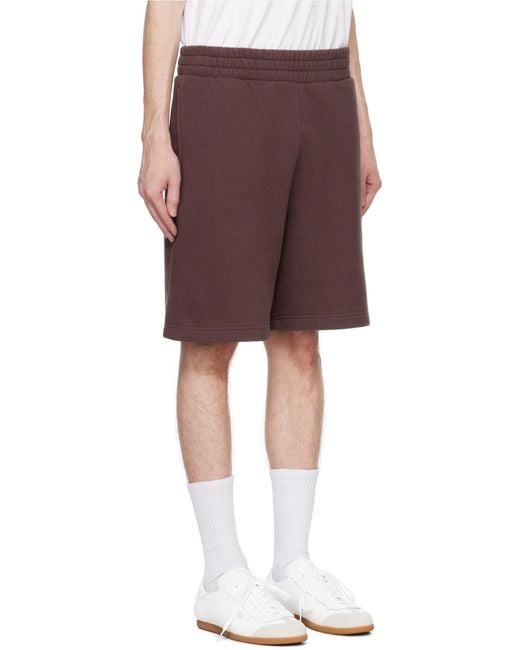 Palm Angels Purple Logo Printed Elastic Waist Track Shorts for men