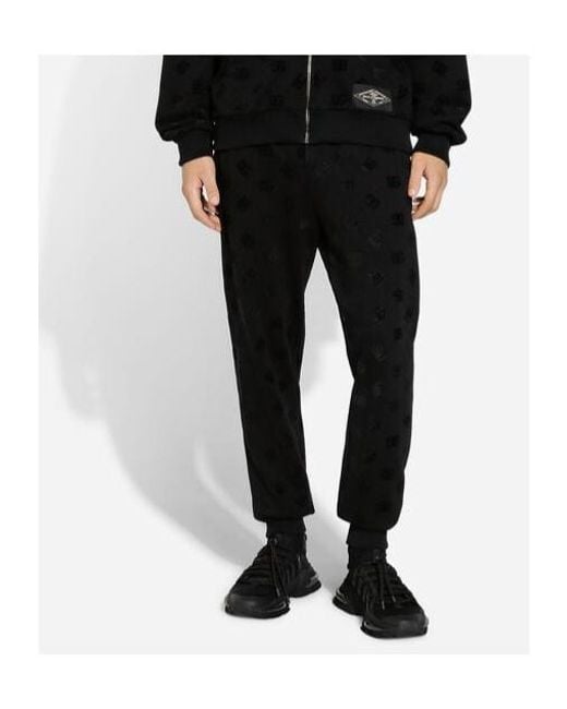 Dolce & Gabbana Black Monogram-Embossed Cotton Track Pants for men