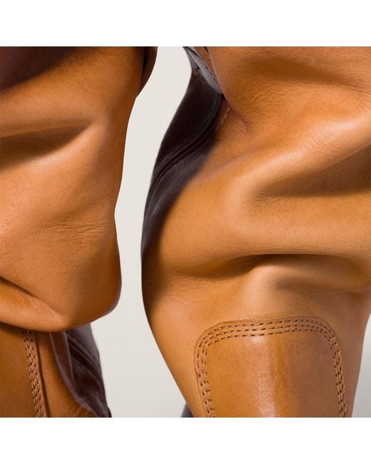 Miu Miu Brown Pull-On Mid-Calf Boots