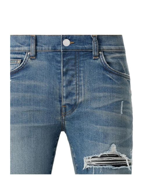 Amiri Blue Distressed Skinny Jeans for men