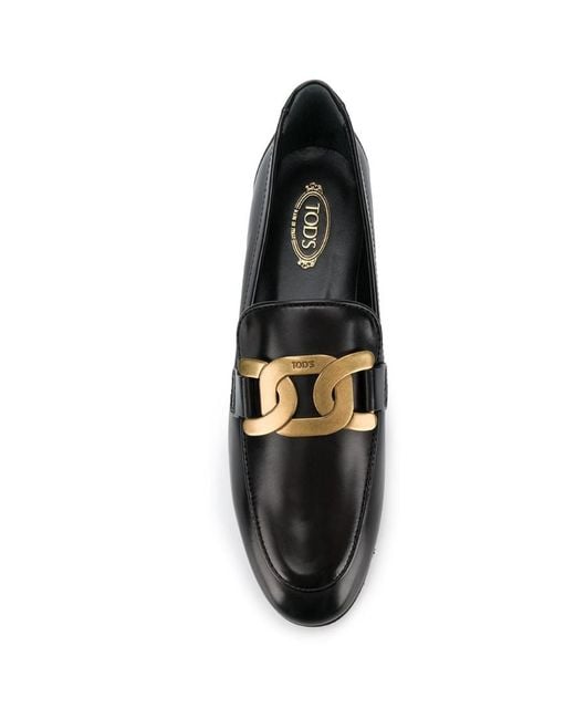 Tod's Black Chain And Loafer Shoes