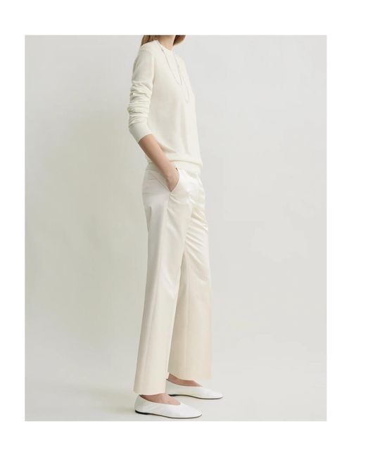 Totême White Totême Kick Flare Raw-Edge Pants