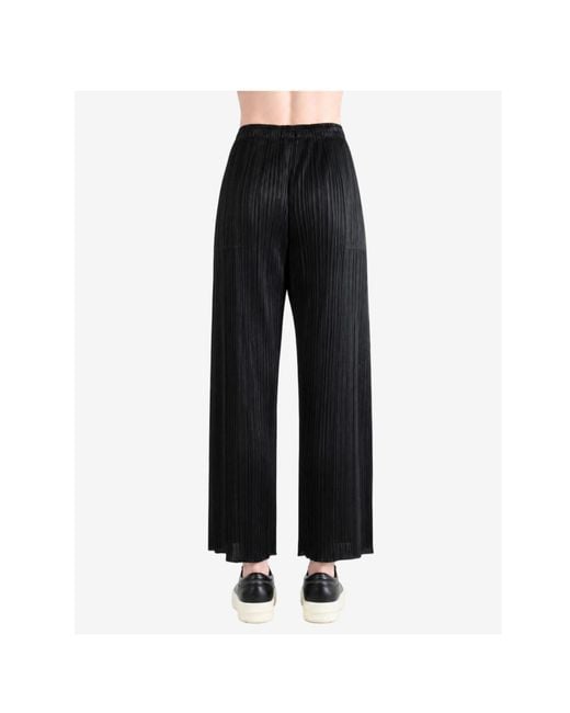 Pleats Please Issey Miyake Black Pleats Please Issey Miyake Pleated Trousers