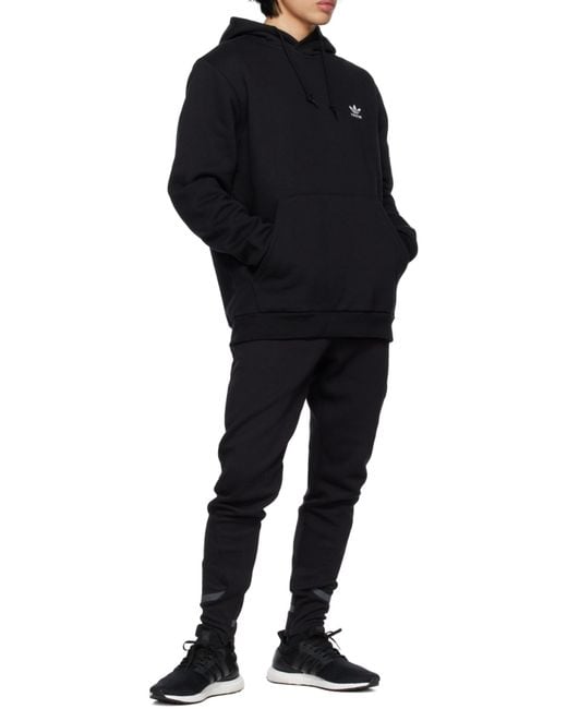 Adidas Originals Black Adidas Gameday Logo Patch Track Pants for men