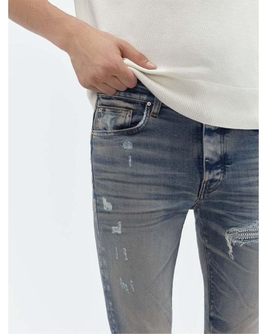 Amiri Blue Belt-Strap Jeans for men