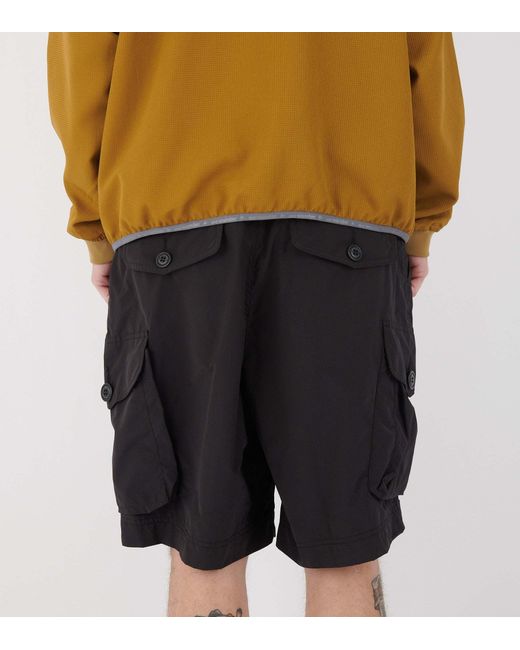 And Wander Black Oversized Cargo Shorts for men