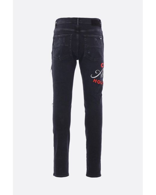 Amiri Blue Embroidered Distressed Jeans for men