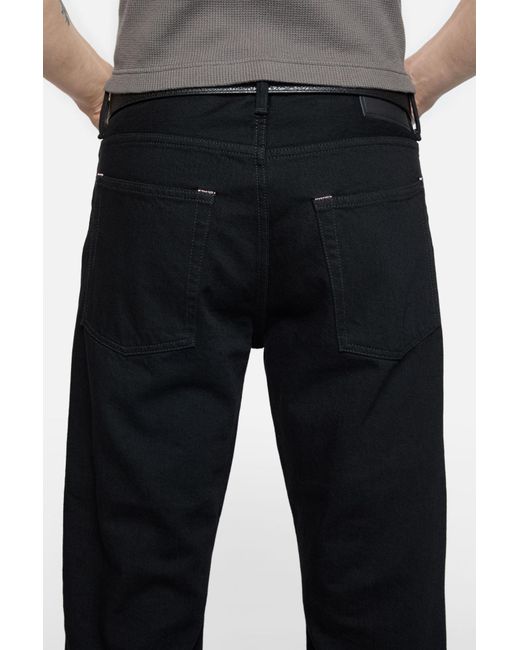 Acne Black Button Detailed Flared Jeans for men
