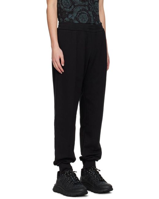 Versace Black Logo-Embroidered Elasticated Waistband Track Pants for men