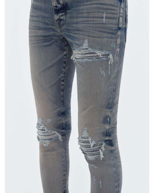 Amiri Blue Belt-Strap Jeans for men