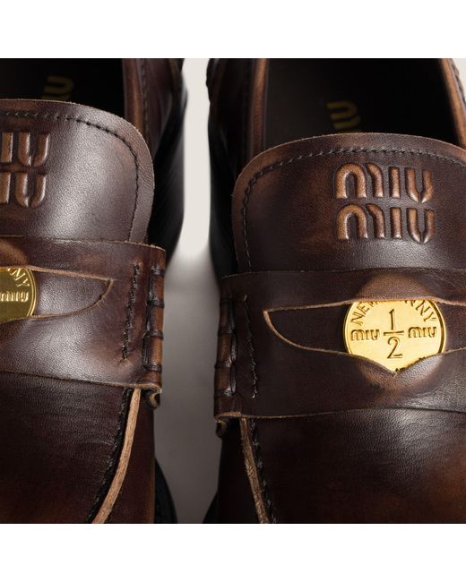 Miu Miu Brown Logo-Embossed Penny Loafers