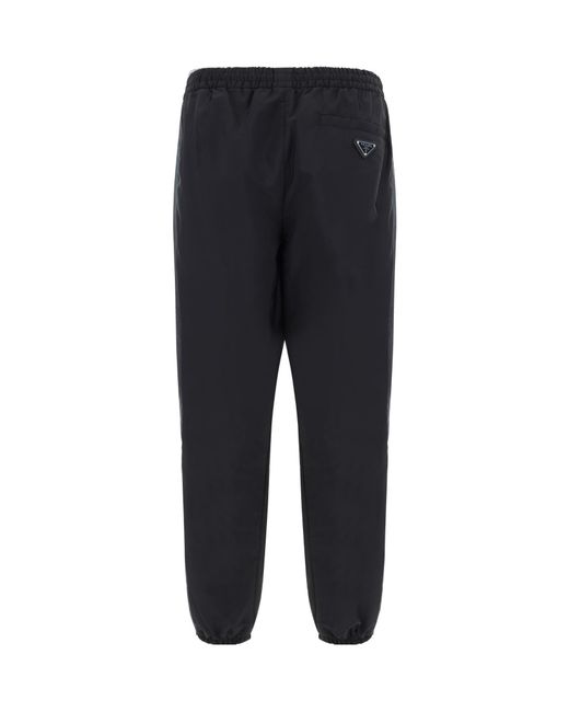 Prada Black Enamel Triangle-Logo Track Pants for men