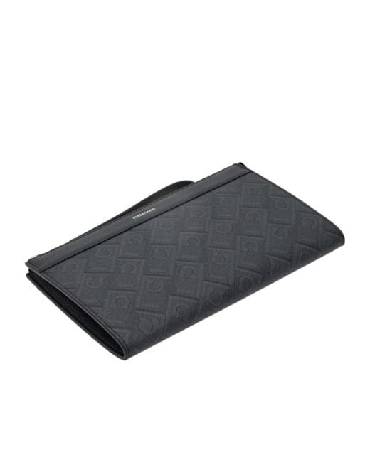 Ferragamo Black Ferragamo Monogram Printed Zipped Wristlet Bag for men