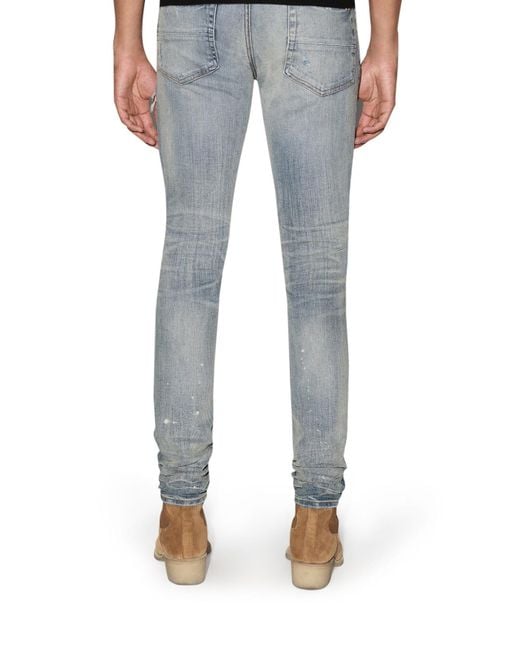 Amiri Blue Distressed-Finish Ripped Skinny Jeans for men