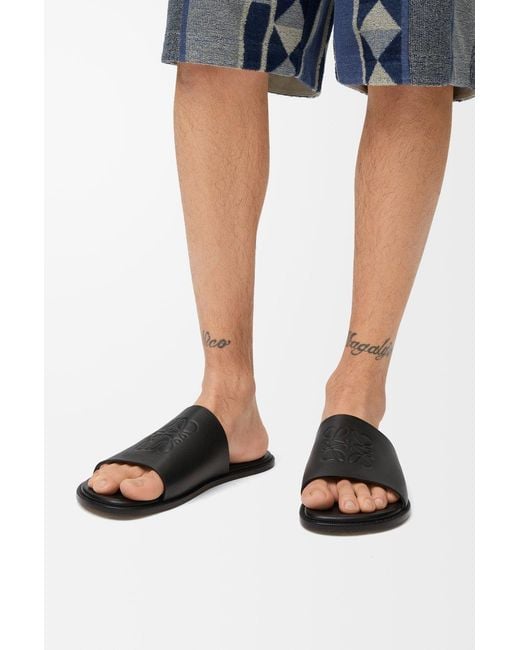 Loewe Black Flex Anagram Round Toe Slides for men