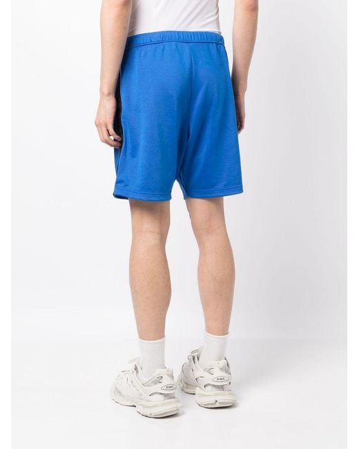 Heron Preston Blue Logo-Patch Track Shorts for men