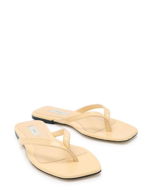 Totême Natural Patent Leather Flip Flops